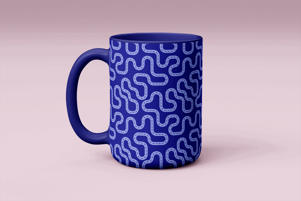 Mug mockup with abstract blue line pattern inspired by the curves of the Road to Hana – Moana Mood design