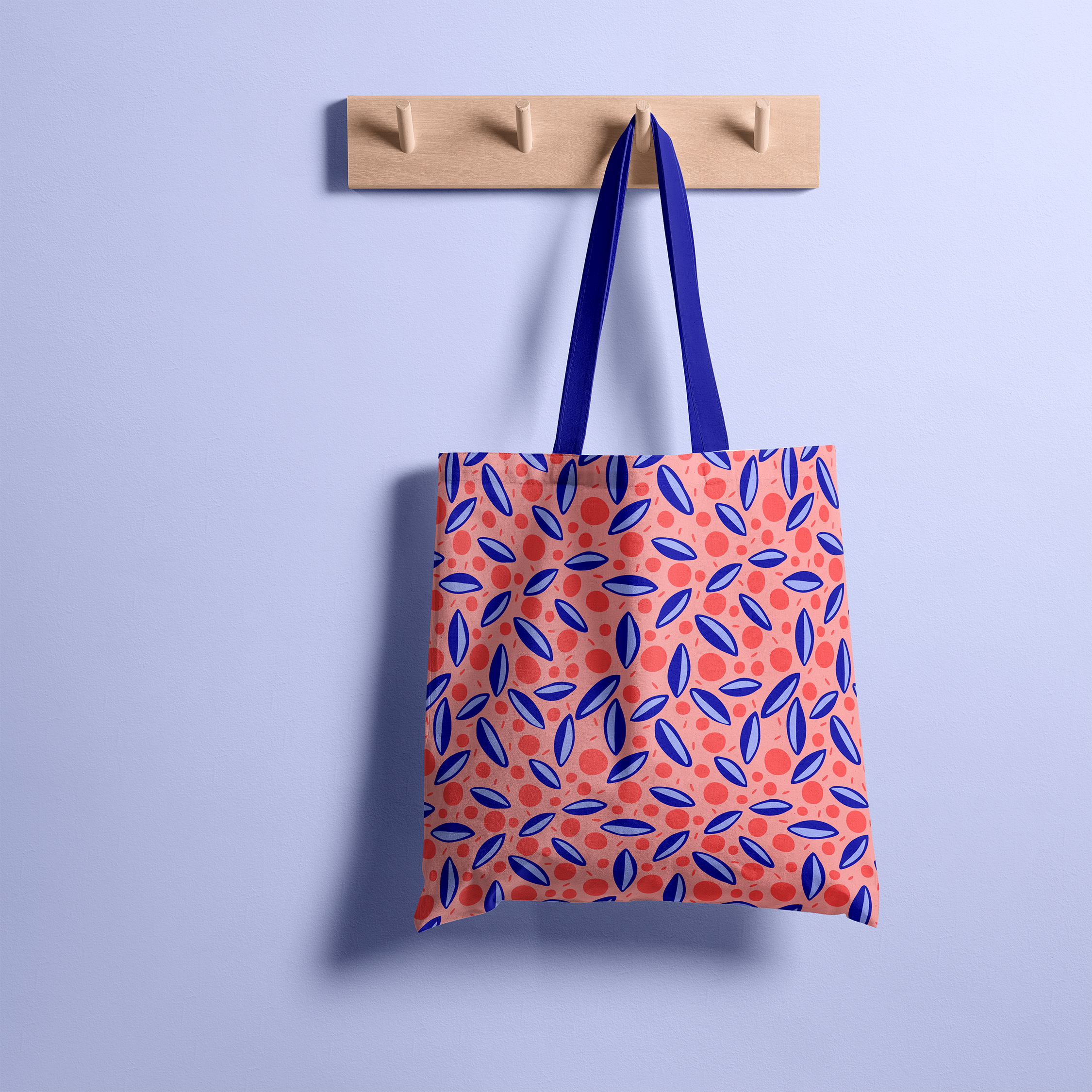 Totebag mockup with a playful pattern with surfboards and water bubbles in coral and blue – Moana Mood surf-inspired print